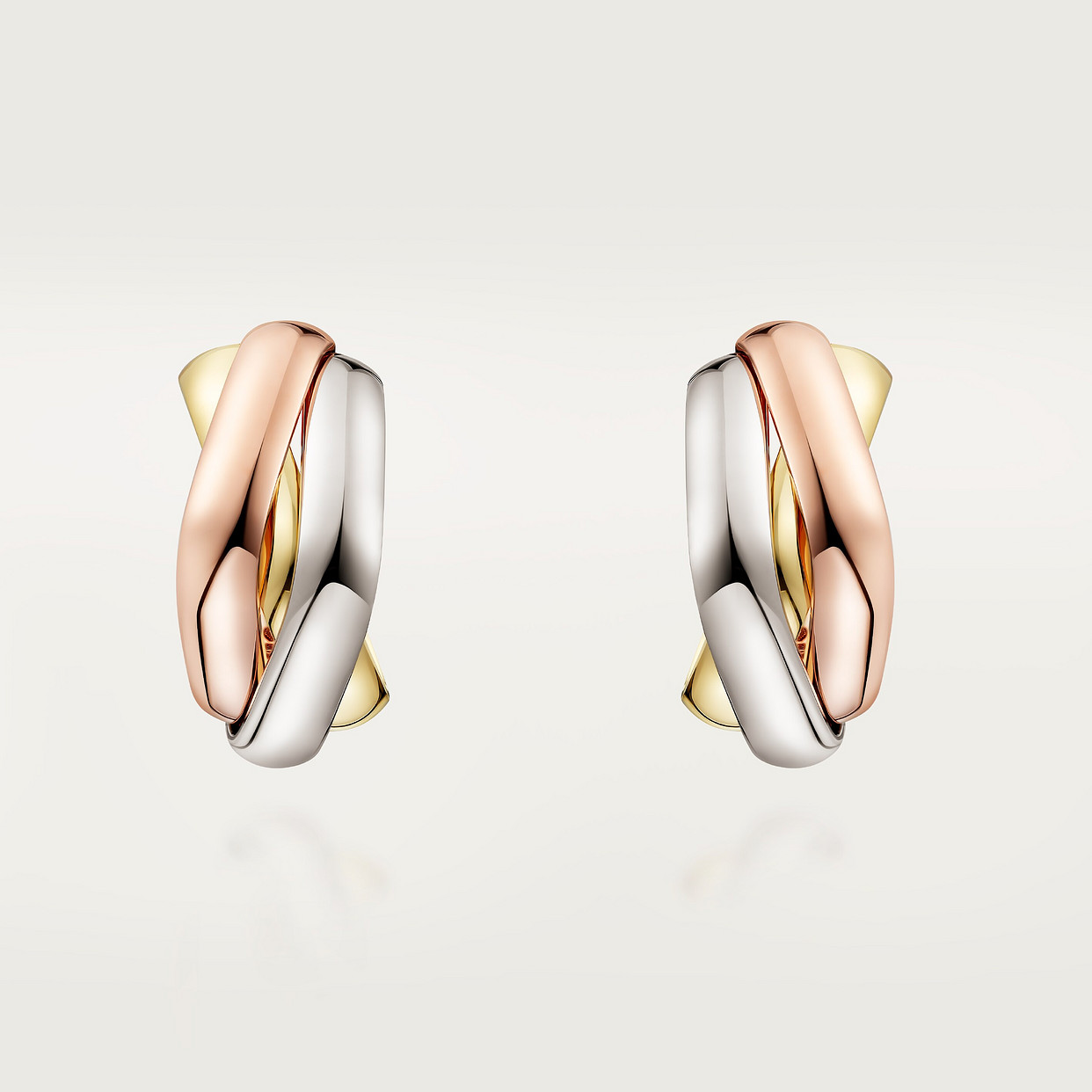 

Серьги Cartier Boucles d'oreilles Trinity, de forme coussin, белое золото