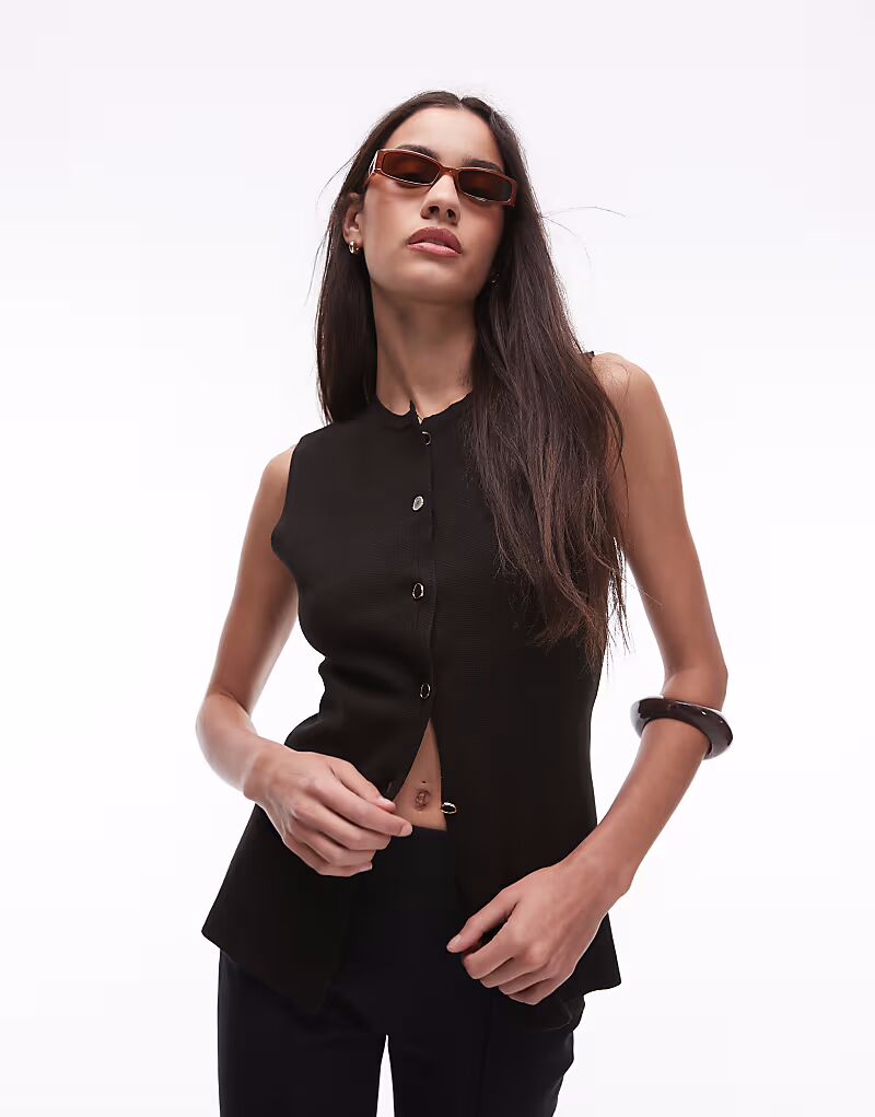 

Жилет с застежкой на пуговицы темно-коричневого цвета Mango