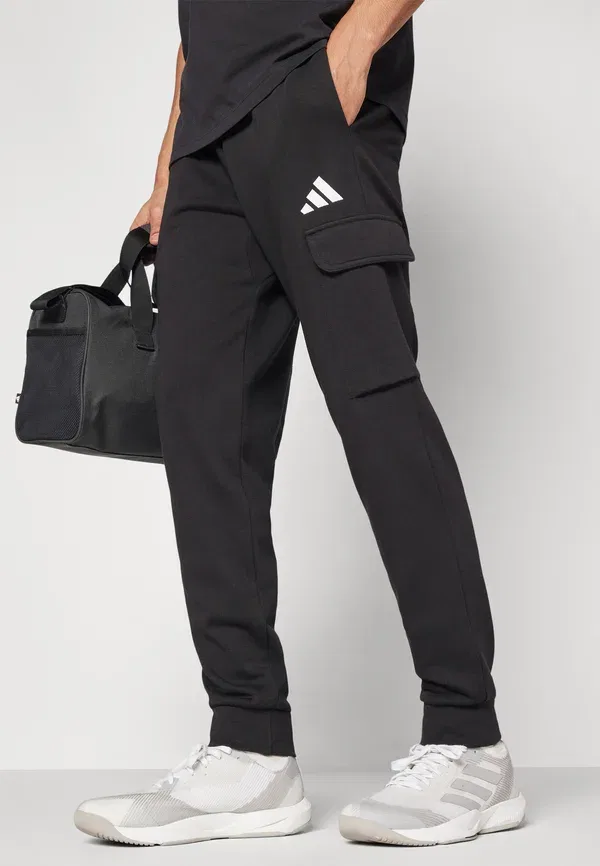 Спортивные штаны Essentials feel cozy cargo tracksuit bottoms Adidas Sportswear, черный/белый — фото 4