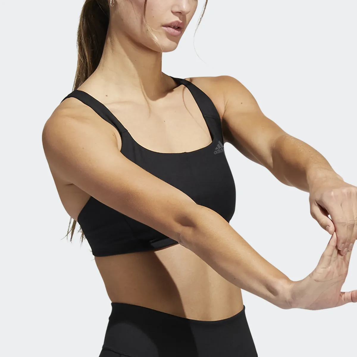

Спортивный бюстгальтер adidas Performance "COREFLOW MEDIUM-SUPPORT", цвет Black / Carbon Dd