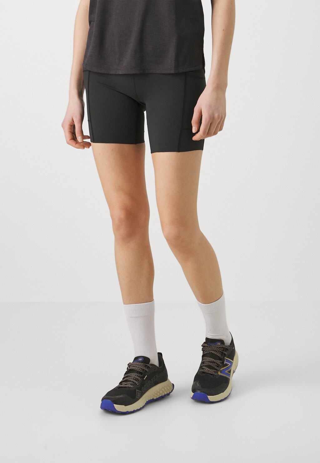 

Леггинсы ATHLETICS 6 INCH FITTED HIGH RISE SHORT New Balance, цвет black