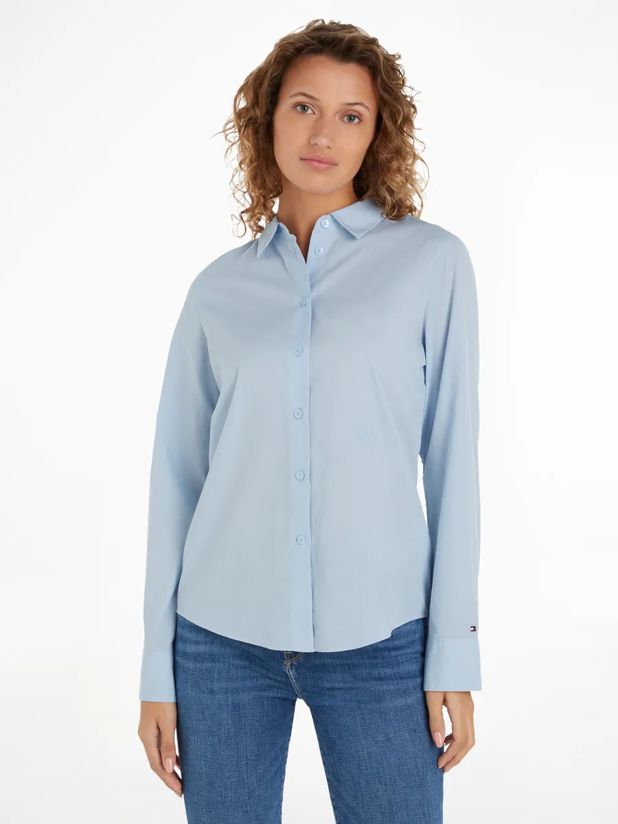 

Блузка-рубашка Tommy Hilfiger "ESS POPLIN REGULAR SHIRT", из поплина, с вышитым логотипом Tommy Hilfiger, синий