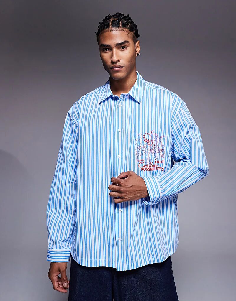 

Рубашка свободного кроя ASOS DESIGN в полоску с вышивкой на груди синего цвета