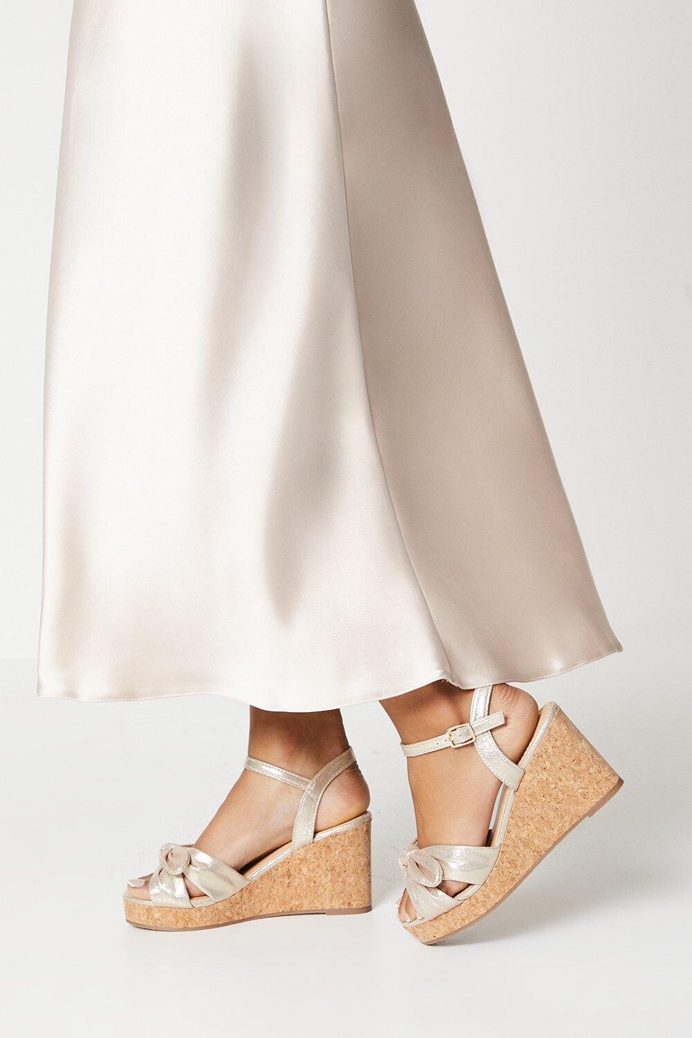 

Широкие туфли на танкетке Rikki Bow Dorothy Perkins, золото