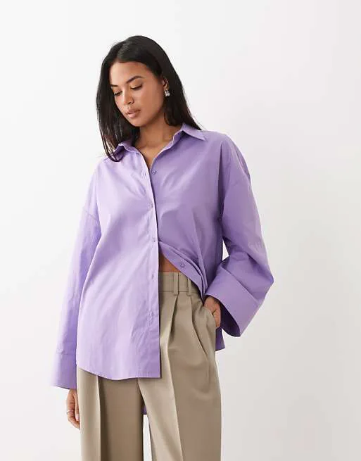 

Фиолетовая рубашка оверсайз с широкими рукавами ASOS DESIGN