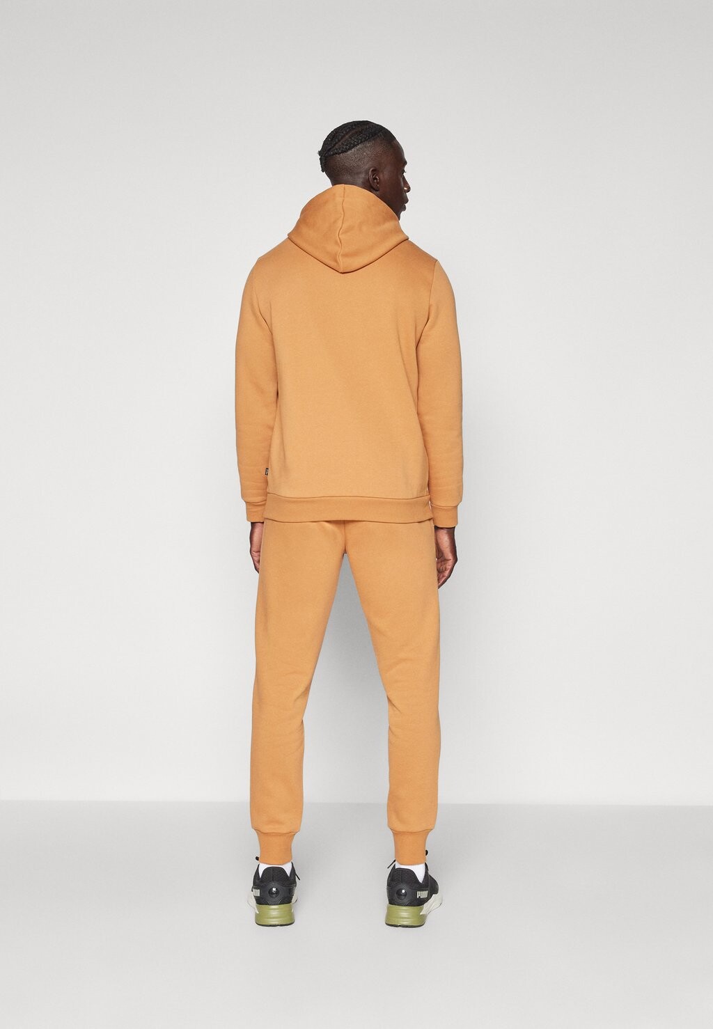 

Спортивные брюки LOGO PANTS Puma, коричневый