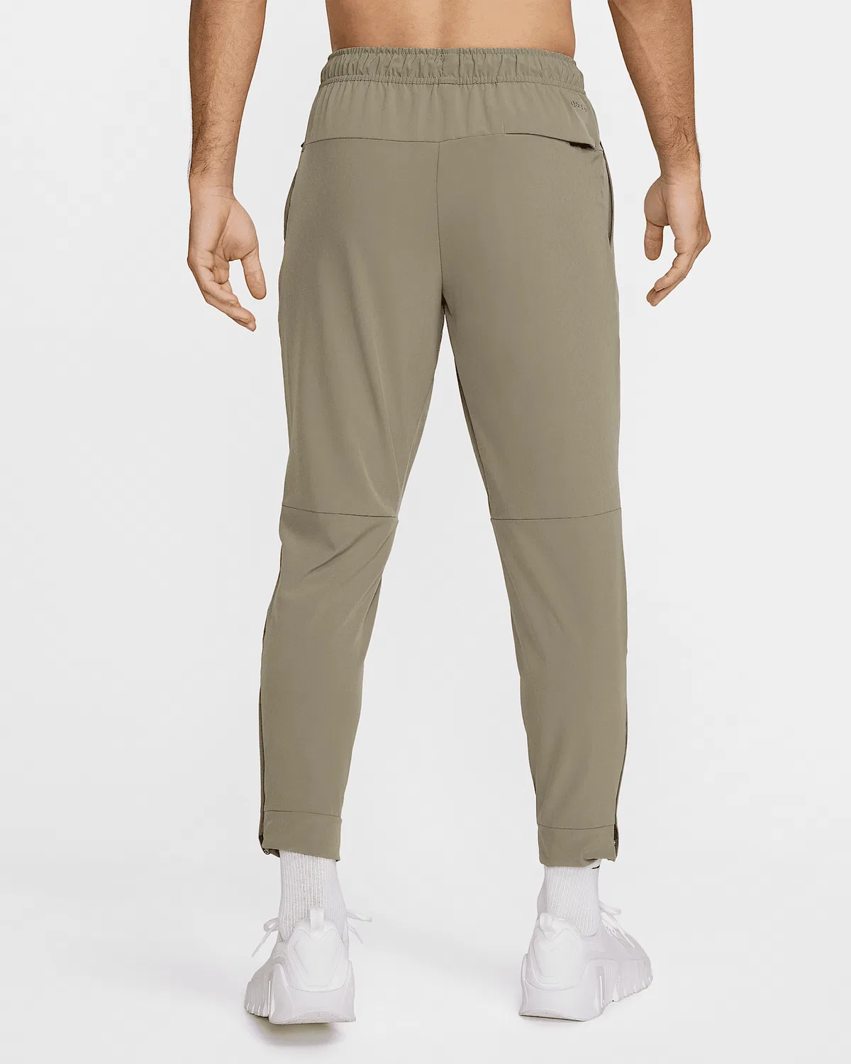 Мужские тренировочные штаны Nike Unlimited Dri-FIT с застежкой-молнией на манжетах, Light Army/Black/Light Army — фото 2