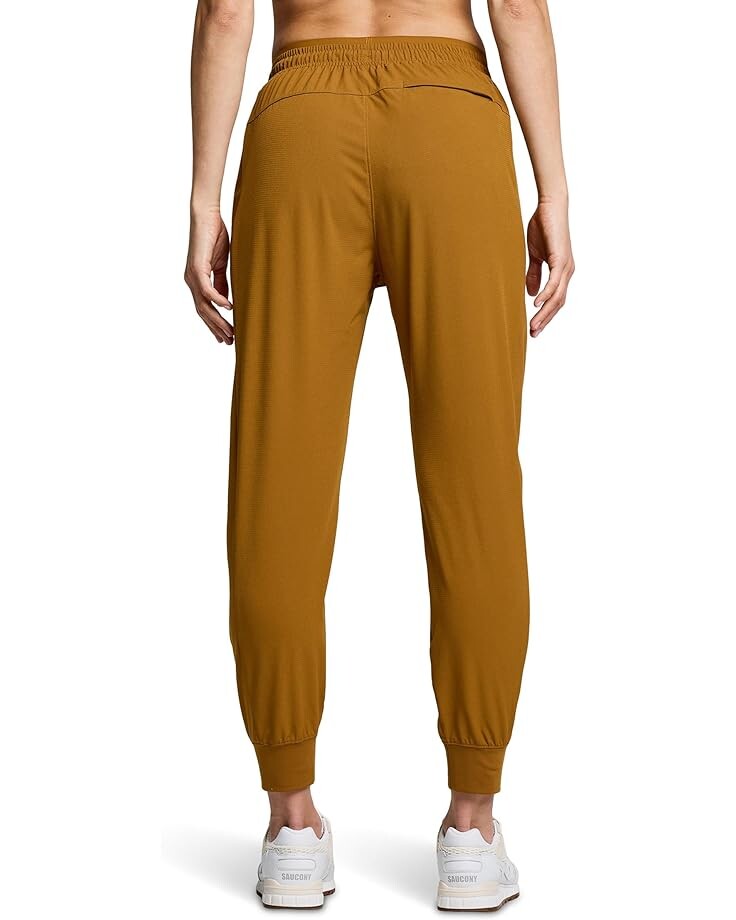 

Брюки Saucony Boston Woven Pants, бронзовый