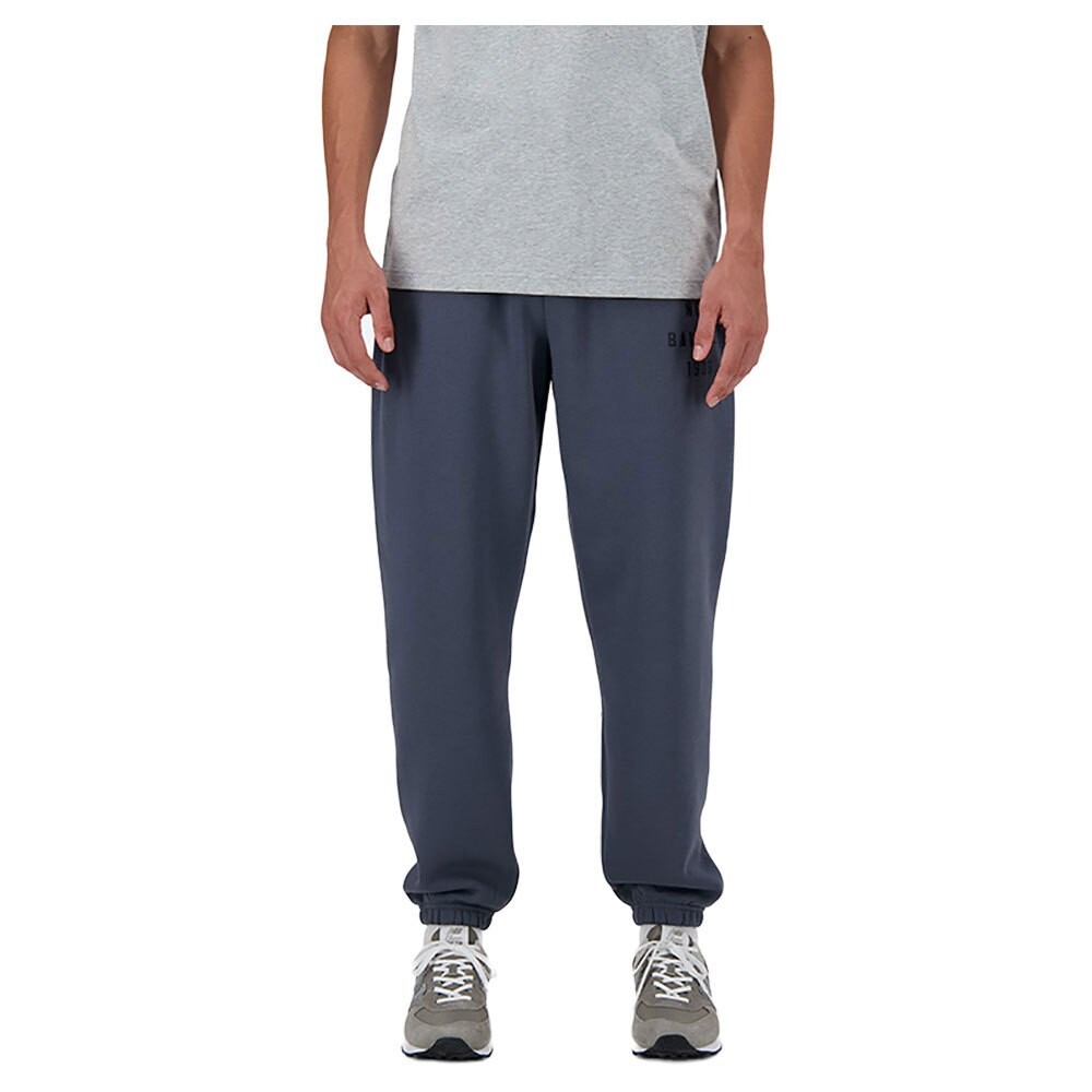 

Джоггеры New Balance Iconic Collegiate, серый