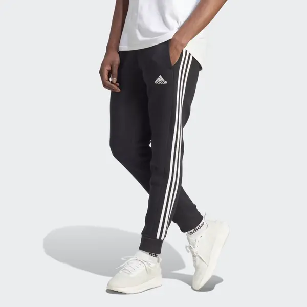 Брюки Essentials флисовые 3 полоски зауженные манжеты джоггеры Adidas, черный — фото 3