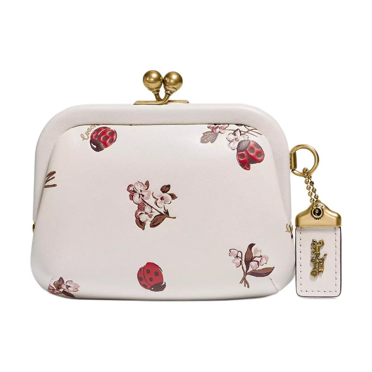 

Кошелек-монетница Kisslock Delicate Calfskin Mini женский белый COACH