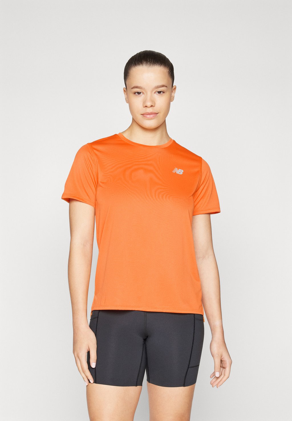 

Спортивная футболка ESSENTIALS New Balance, оранжевый
