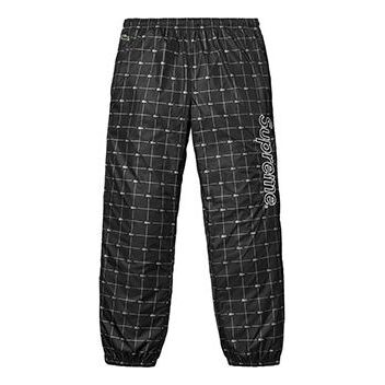 

Брюки ss18 lacoste reflective grid nylon track pant black Supreme, черный