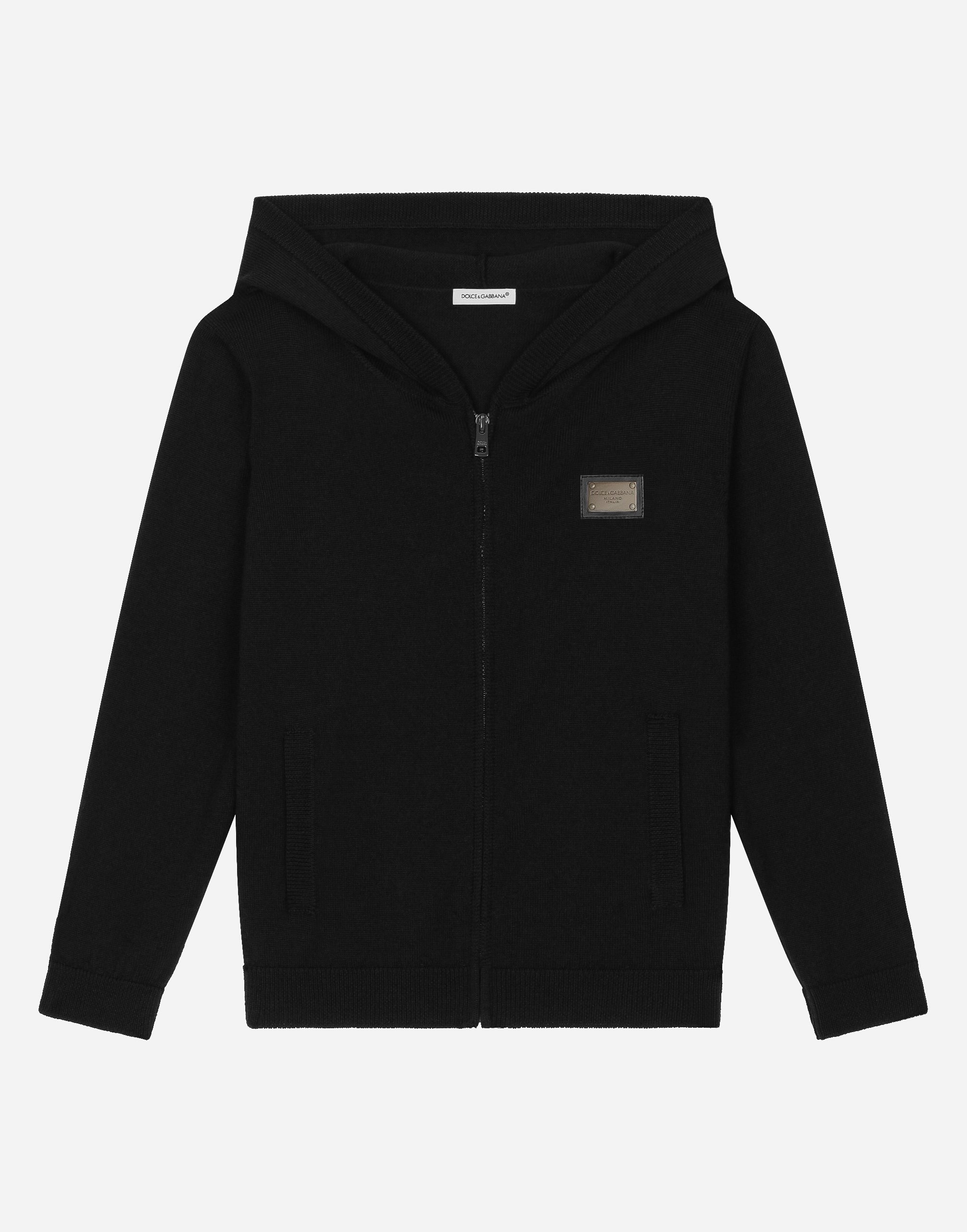 

Кардиган из однотонного трикотажа на молнии с капюшоном и фирменной нашивкой Dolce&Gabbana, синий