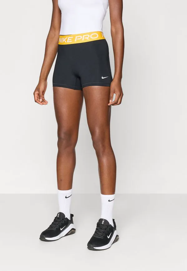 Короткие леггинсы Nike Performance, Black/University Gold-Coloured/White