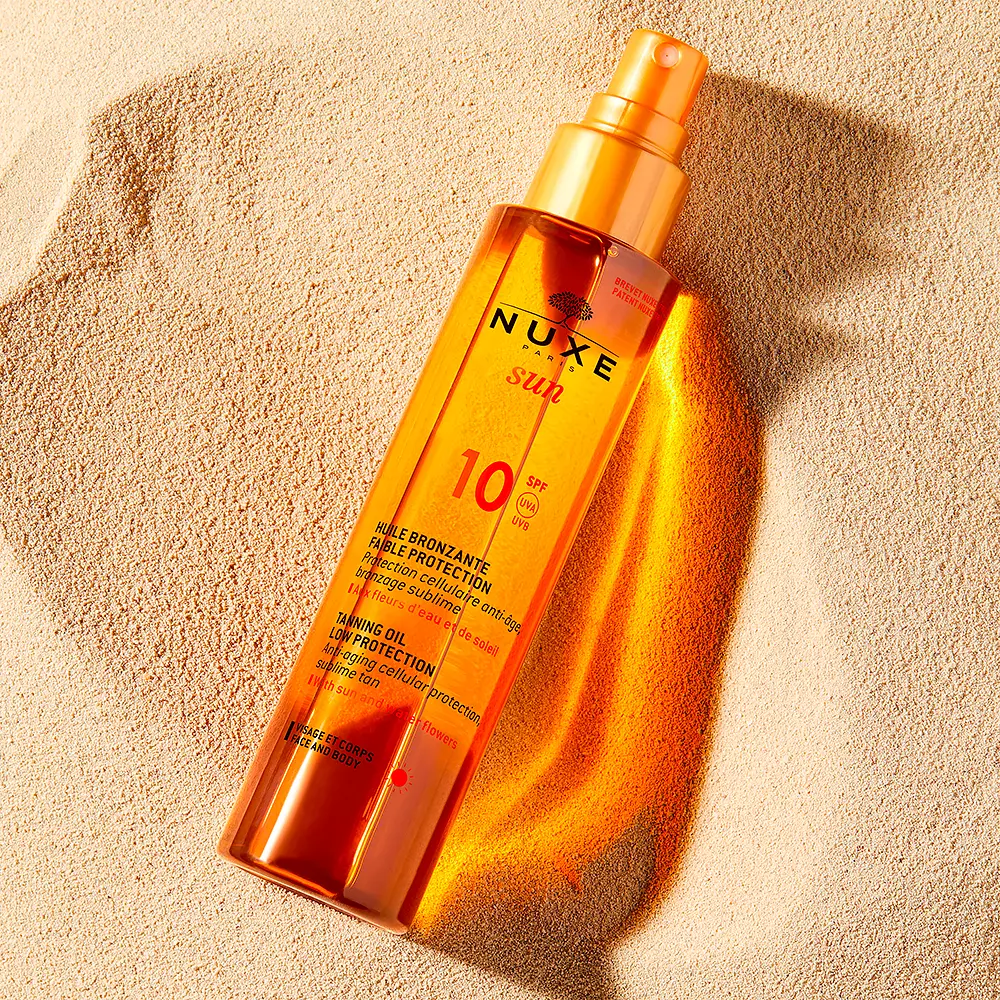 Солнцезащитный крем Nuxe Sun Aceite Bronceador Rostro Y Cuerpo Protección Baja Spf10 Nuxe, 150 мл — фото 2