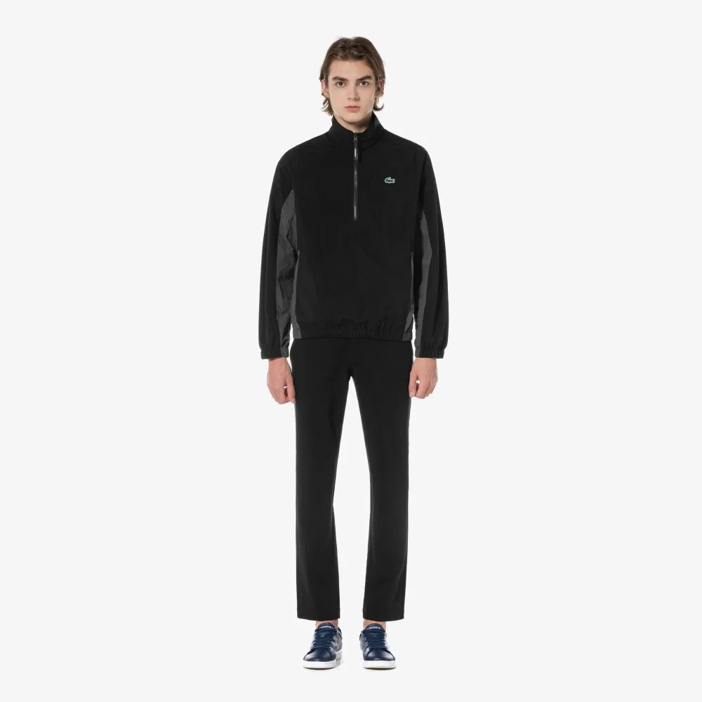 Мужские базовые осенние брюки чёрные от Lacoste