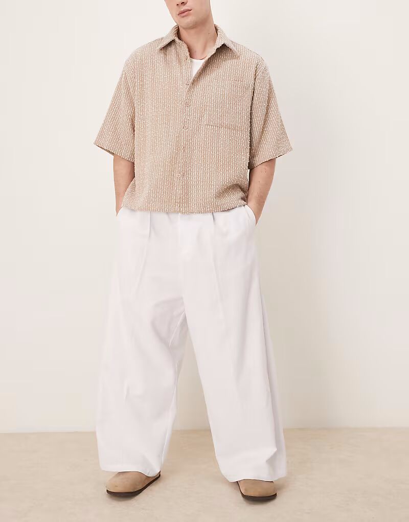 

Брюки-баллоны ASOS DESIGN свободного кроя со складками белого цвета