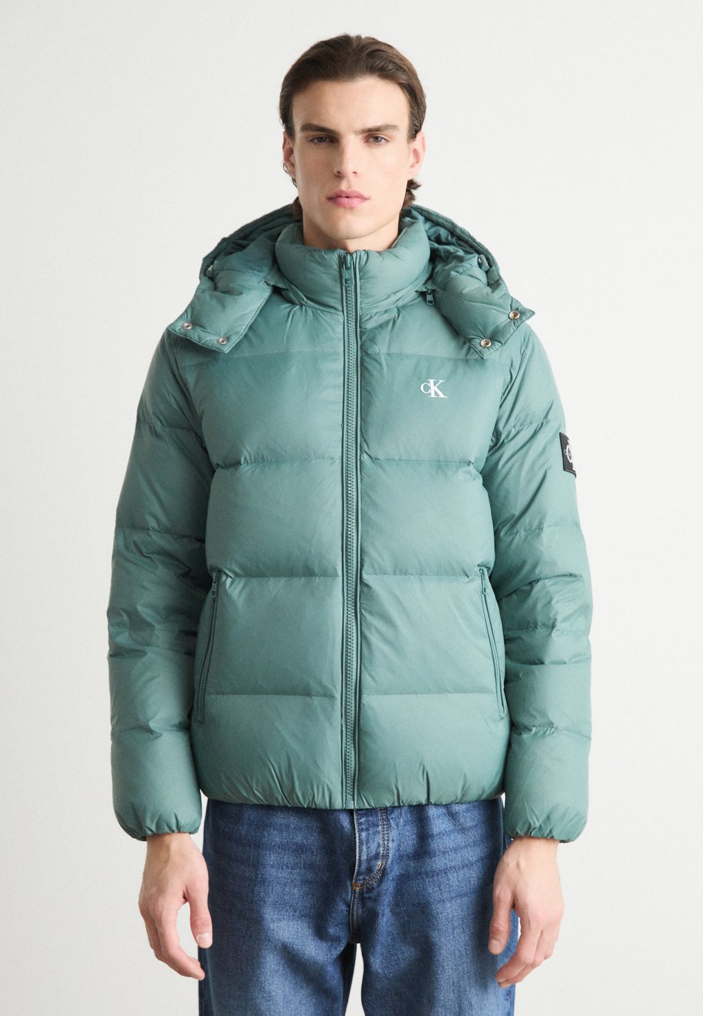

Пуховик ESSENTIALS JACKET Calvin Klein Jeans, синий