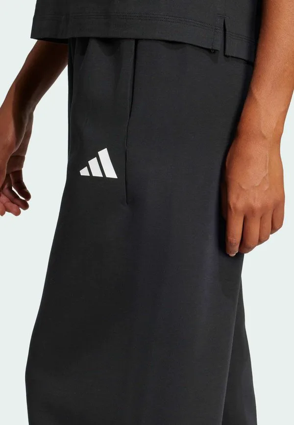 Спортивные штаны future icon с тремя полосками, открытым подолом и свободным кроем. Adidas Sportswear, Black — фото 3