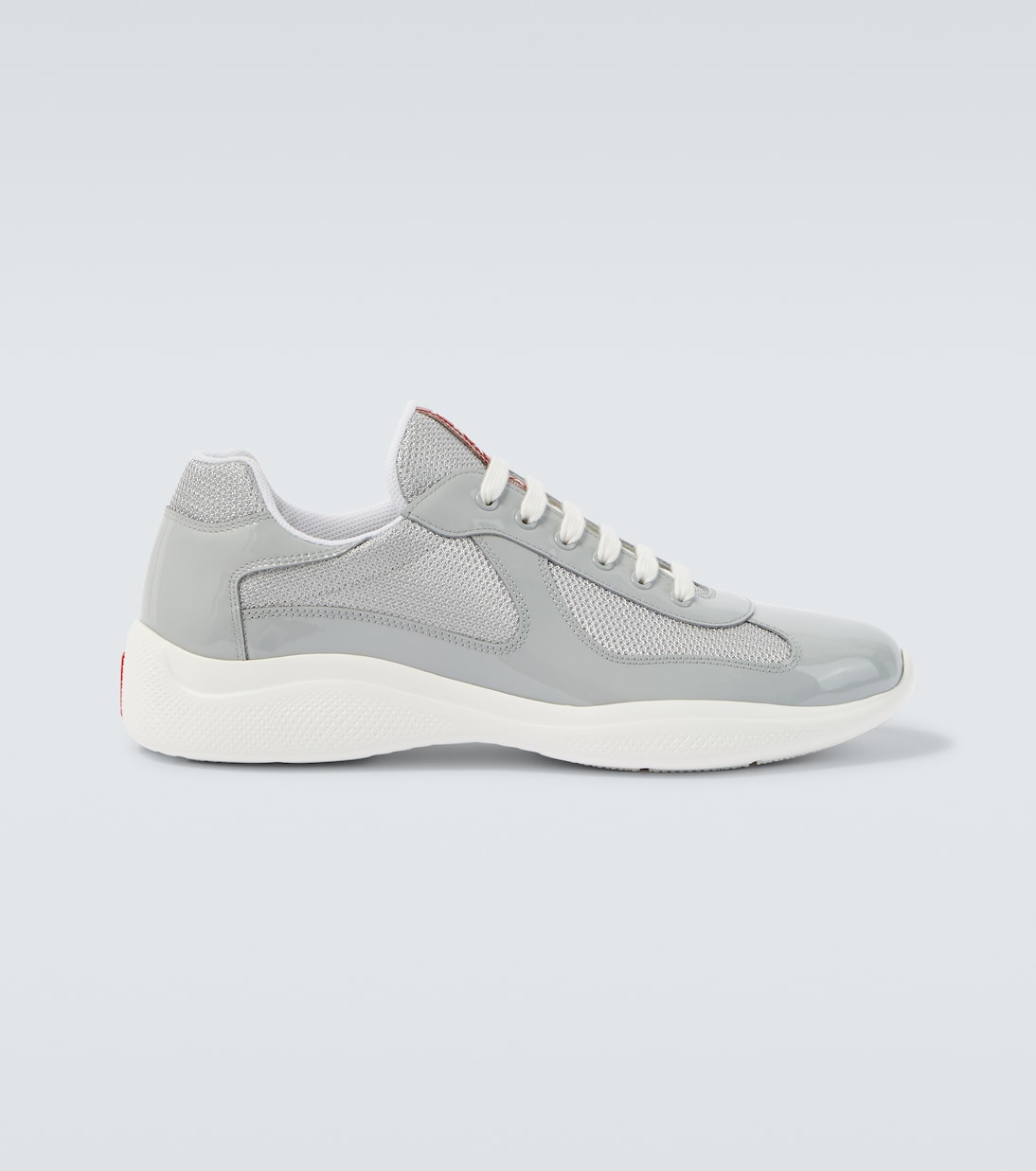 

Кроссовки American's Cup из лаковой кожи Prada, серый