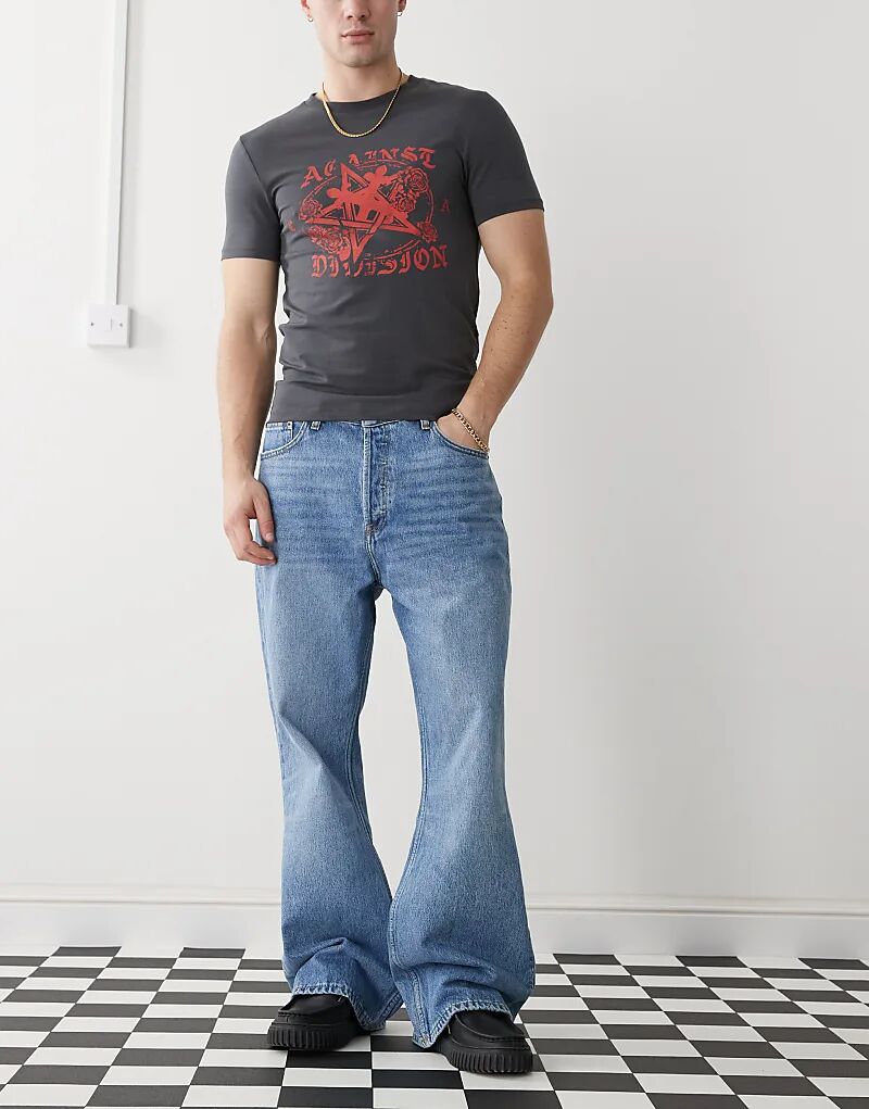 

Джинсы свободного кроя Rift bootcut в цвете «поношенное» синего цвета Dr Denim