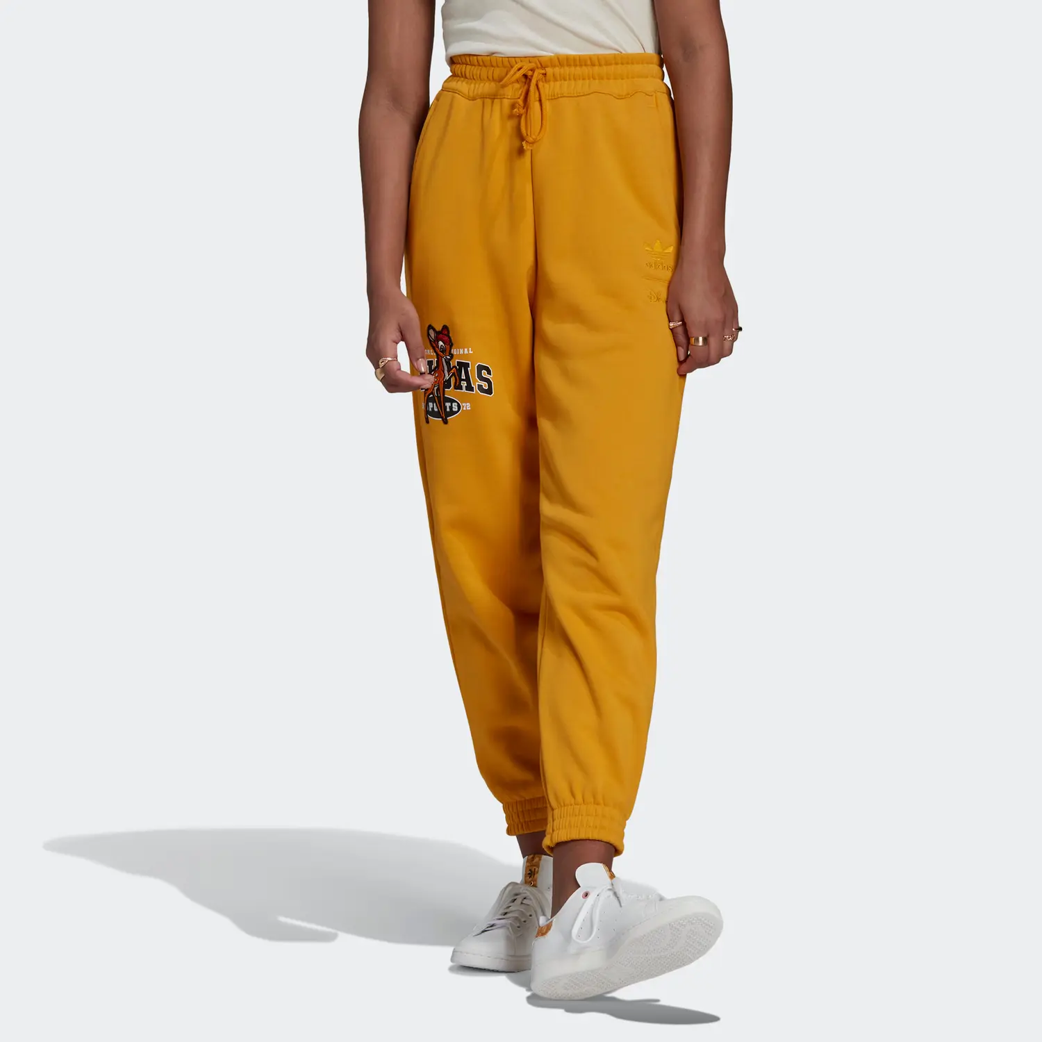 Графические штаны Disney Bambi Adidas Originals, желтый — фото 3