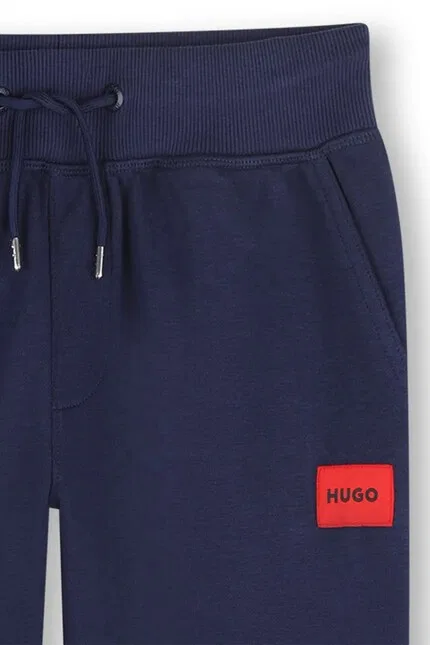 Детские спортивные штаны из эластичного трикотажа HUGO, синий — фото 3