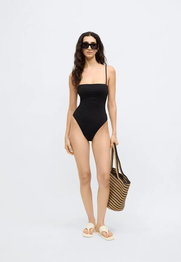 Цельный купальник без бретелей - базовый элемент гардероба. Calvin Klein Swimwear, Black — фото 3
