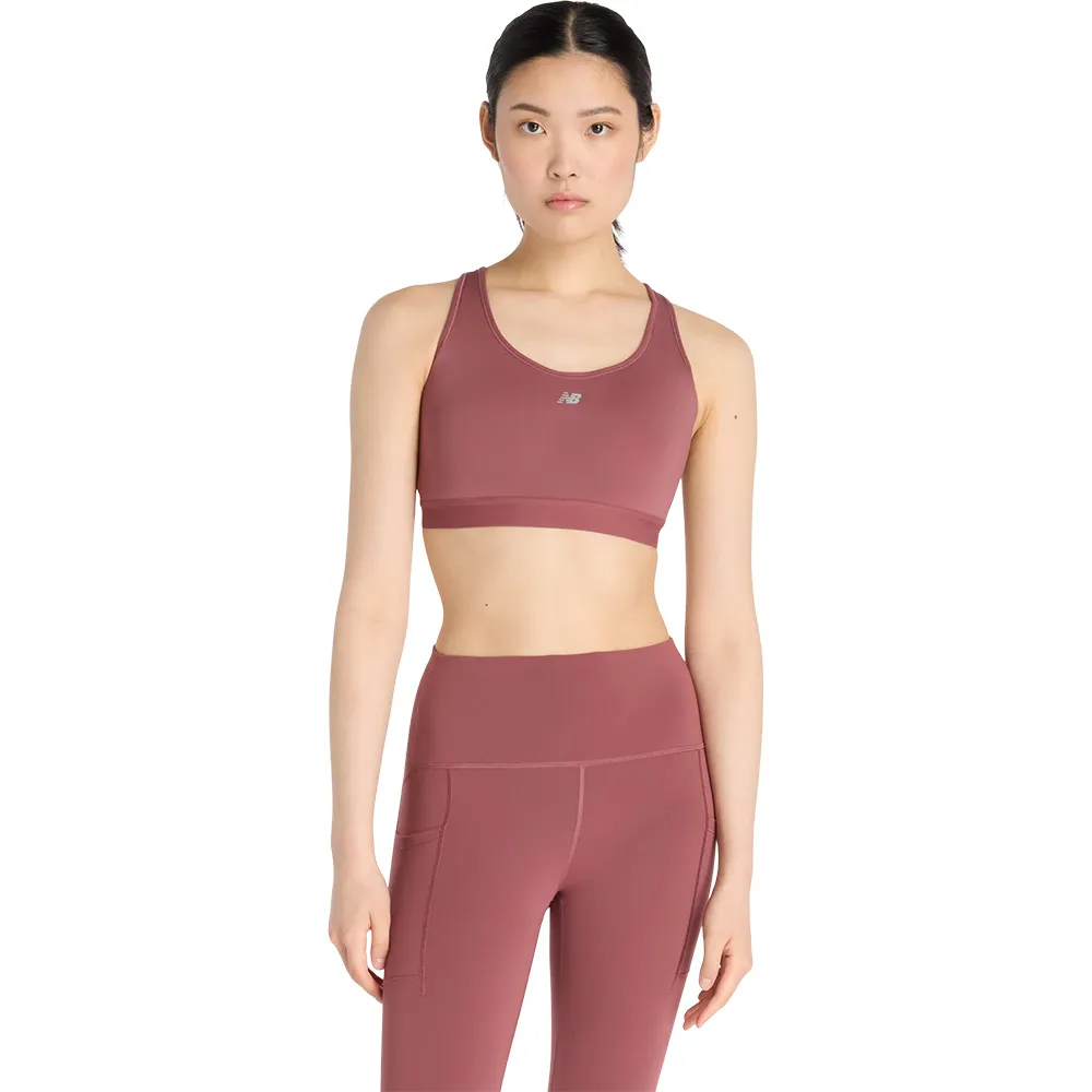 

Спортивный бюстгальтер New Balance Essential sports bra, красный