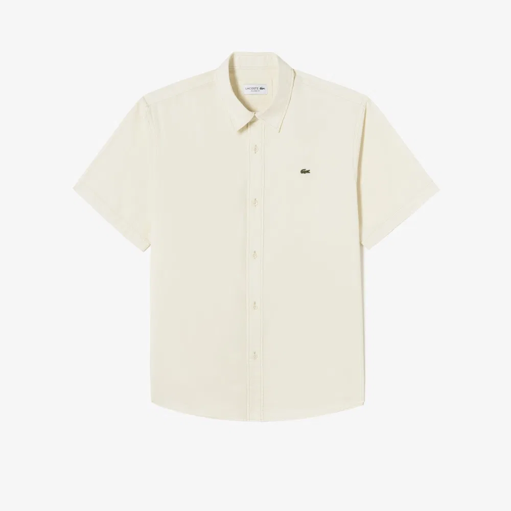 Мужская рубашка из шамбре цвета айвори от Lacoste