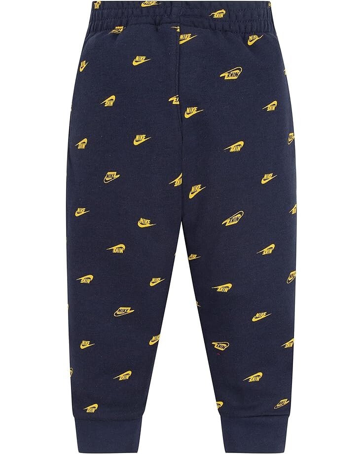 

Брюки Nike NSW Club All Over Print SSNL Pants, цвет Midnight Navy