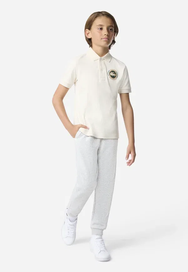 Спортивные штаны Lacoste Core, цвет меланжевый светло-серый — фото 2