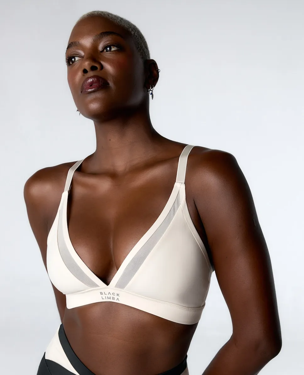 

Спортивный бюстгальтер средней поддержки с деталями из тюля Black Limba, кремовый