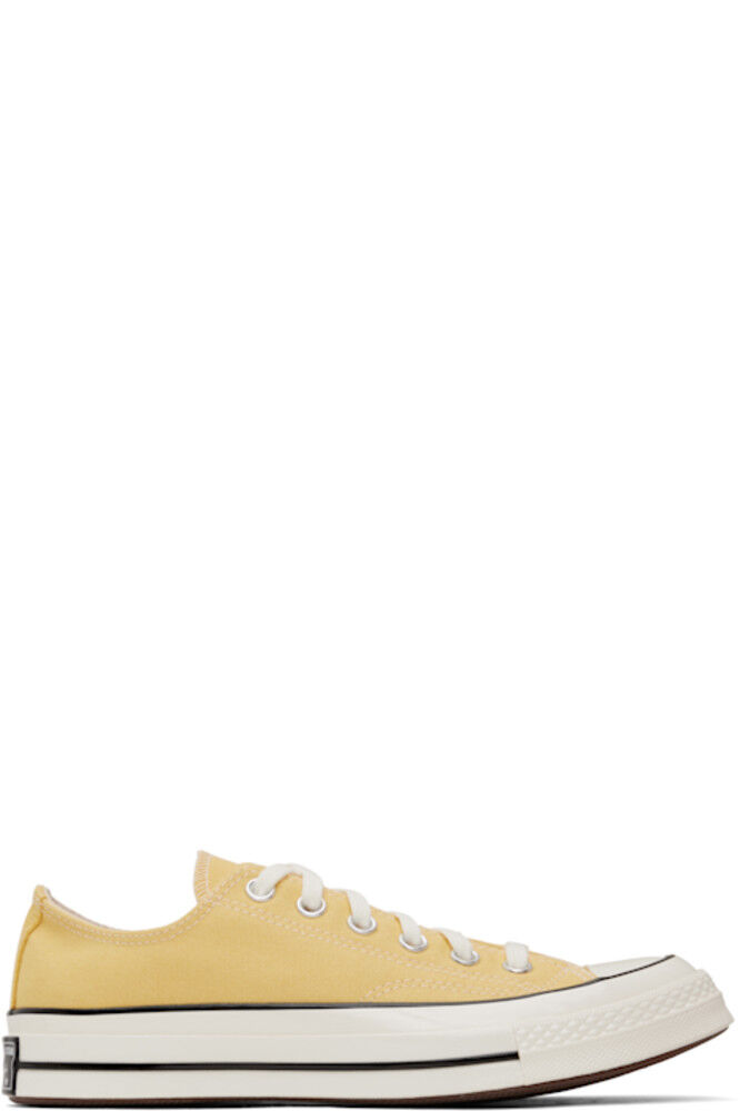 

Желтые кроссовки Chuck 70 Low Top Converse