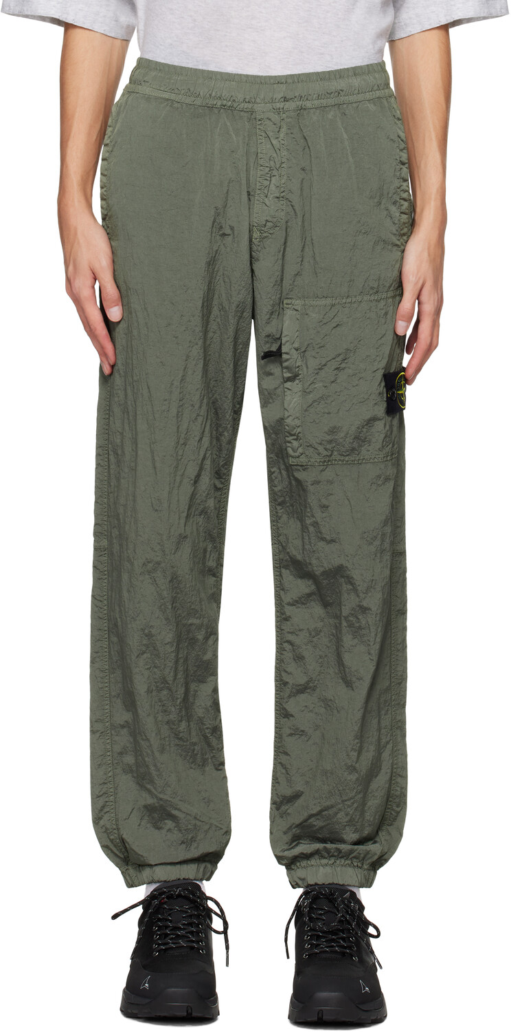 

Зеленые нейлоновые металлические спортивные брюки 31019 Stone Island