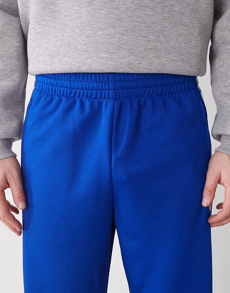 Спортивные брюки Adidas Originals Firebird adicolor mesh синего цвета — фото 4