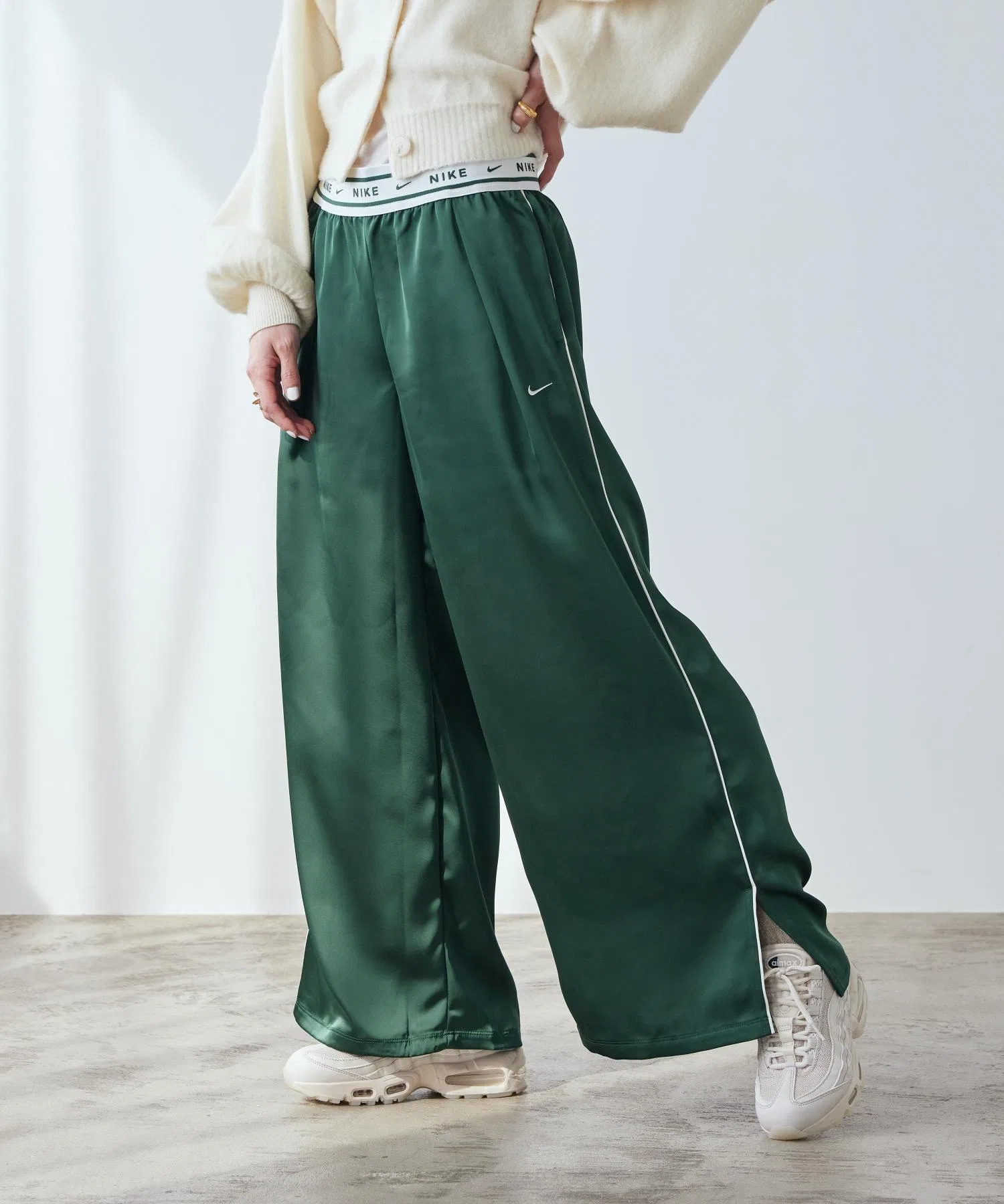 Женские брюки Nike Sportswear Loose Mid-Rise Satin Pants