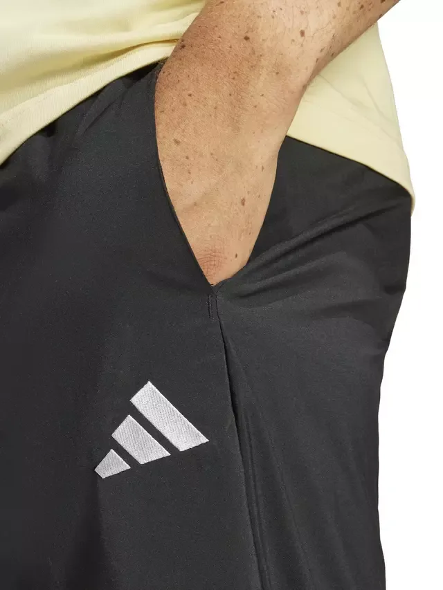 Спортивные брюки Essentials Logo Stanford Training Joggers, черно-белые adidas — фото 3