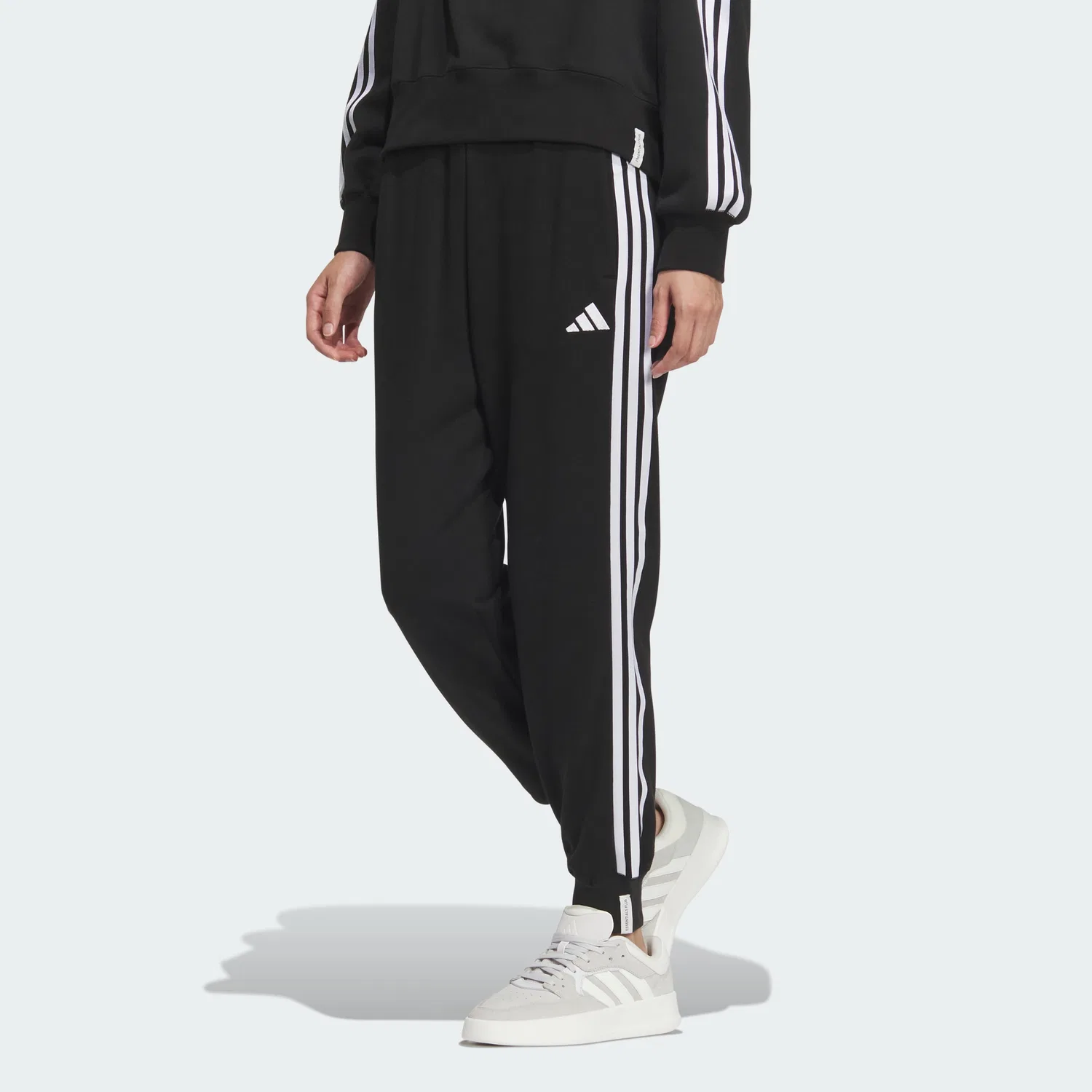 Женские зауженные брюки Essential+ 3S French Terry чёрные от Adidas
