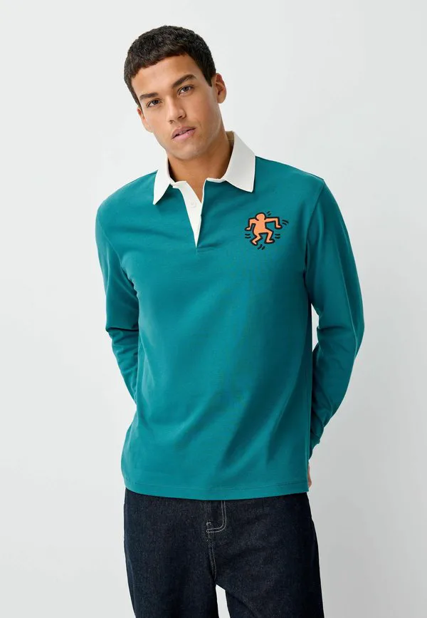 Регбийная рубашка-поло стандартного кроя Next, Teal Blue Keith Haring Licence