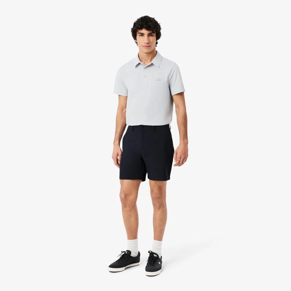 Мужские тёмно-синие твиловые шорты-чиносы бермуды от Lacoste