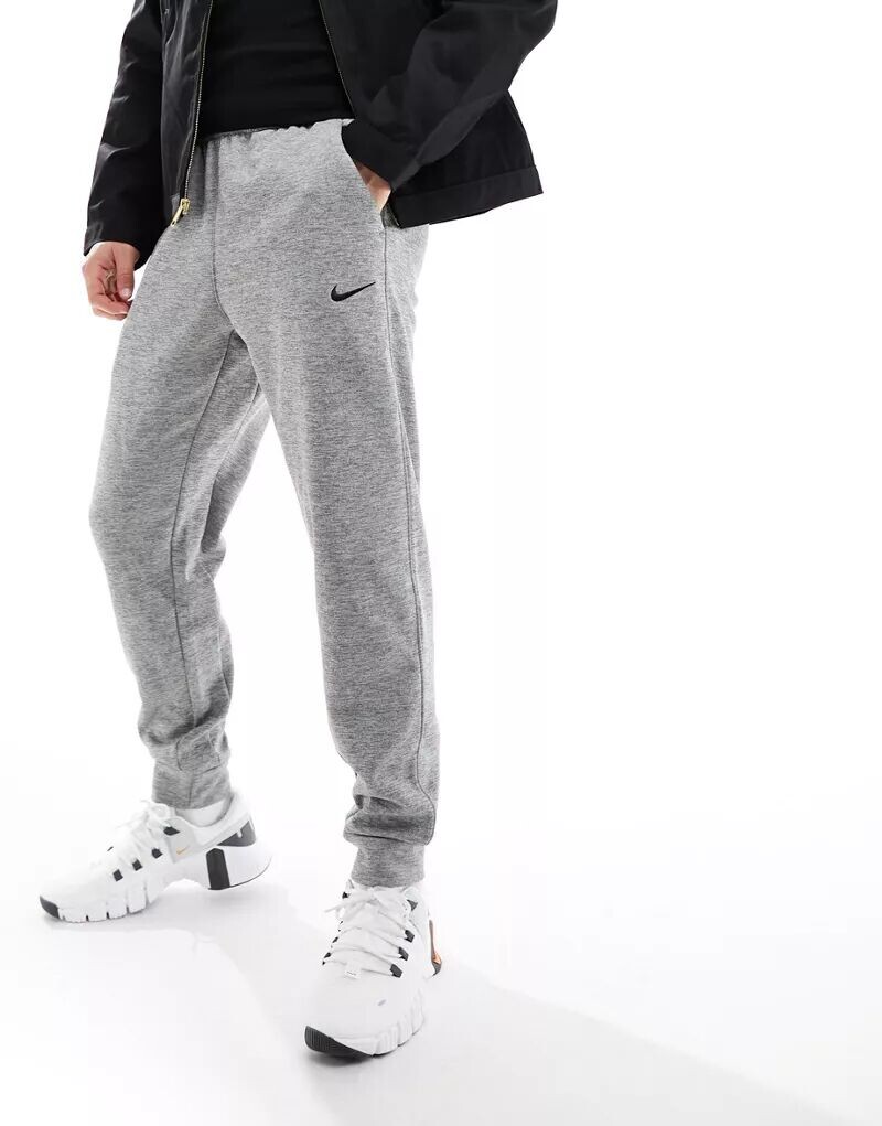 

Серые зауженные джоггеры Nike Dri-Fit