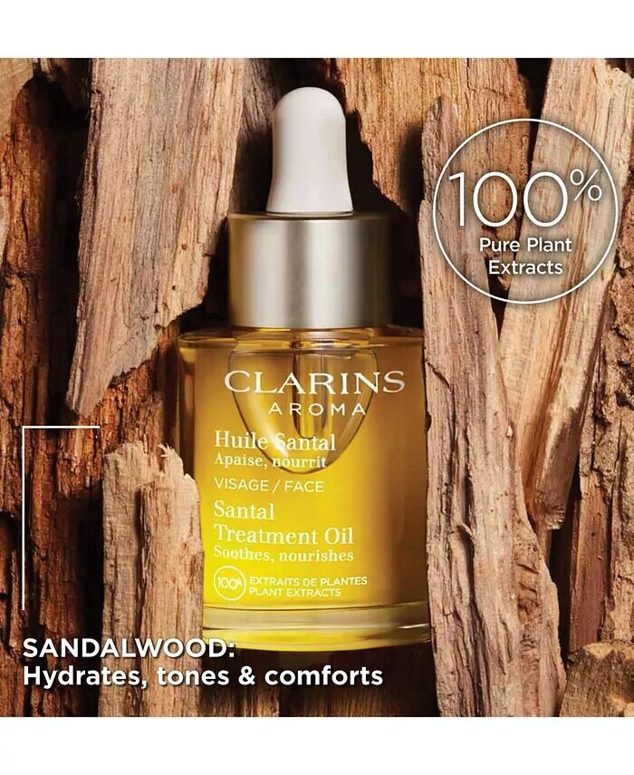 Успокаивающее и увлажняющее масло для ухода за лицом Santal Clarins — фото 3