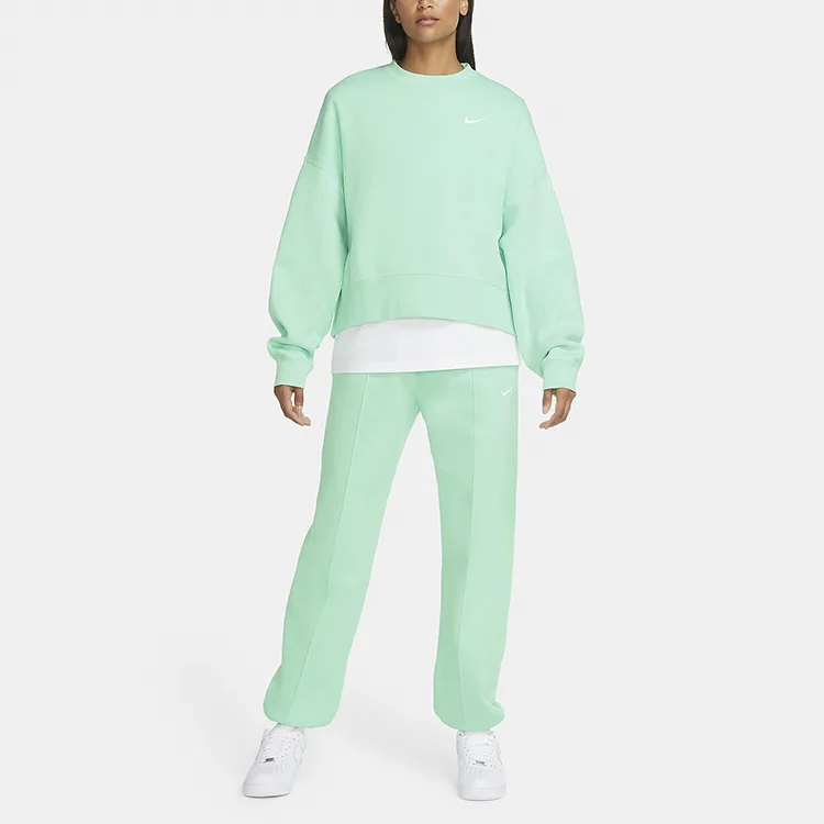 Nike Спортивные эластичные брюки женские tranquil cucumber green с манжетами — фото 4