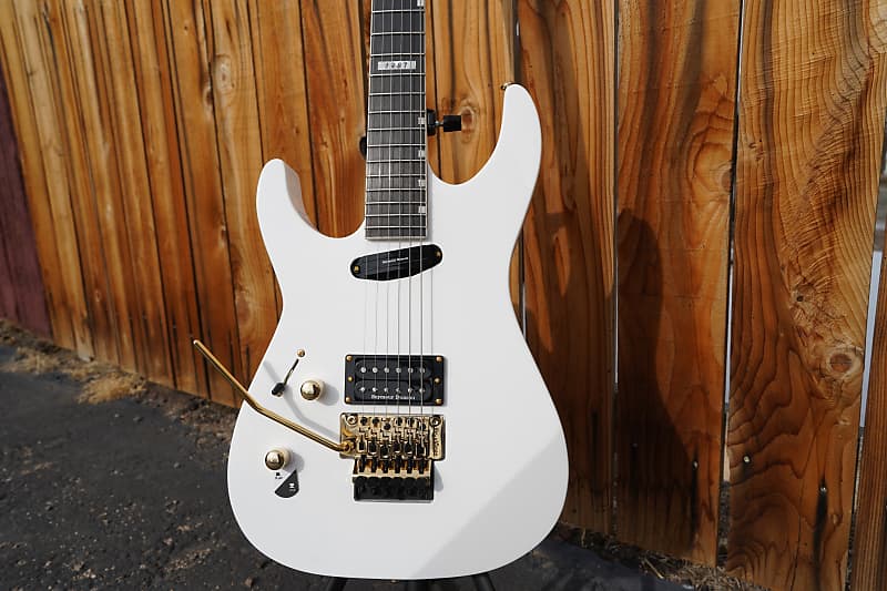 

Электрогитара ESP LTD Mirage Deluxe '87 - Snow White Left Handed 6-String Electric Guitar