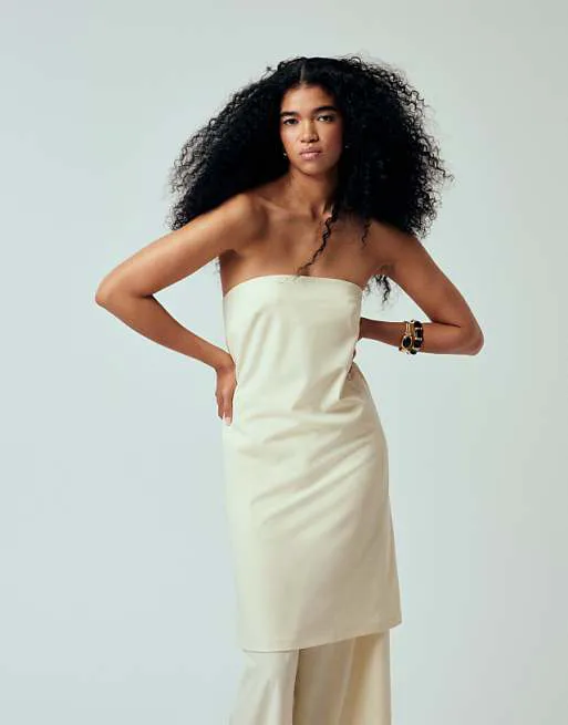 

Длинный топ-табард цвета экрю ASOS DESIGN