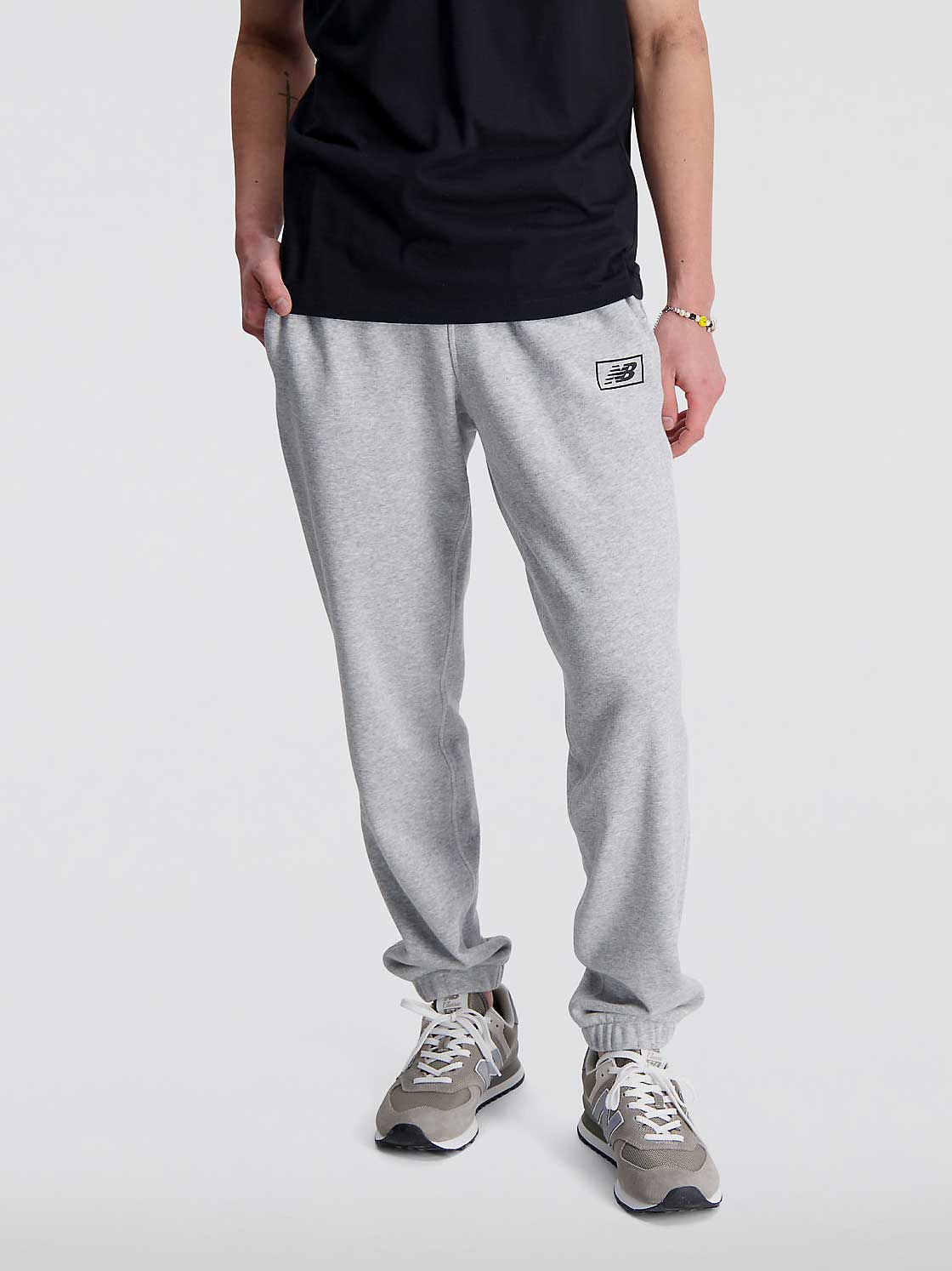 

Спортивные брюки New Balance PANT NB ESSENTIALS, серый