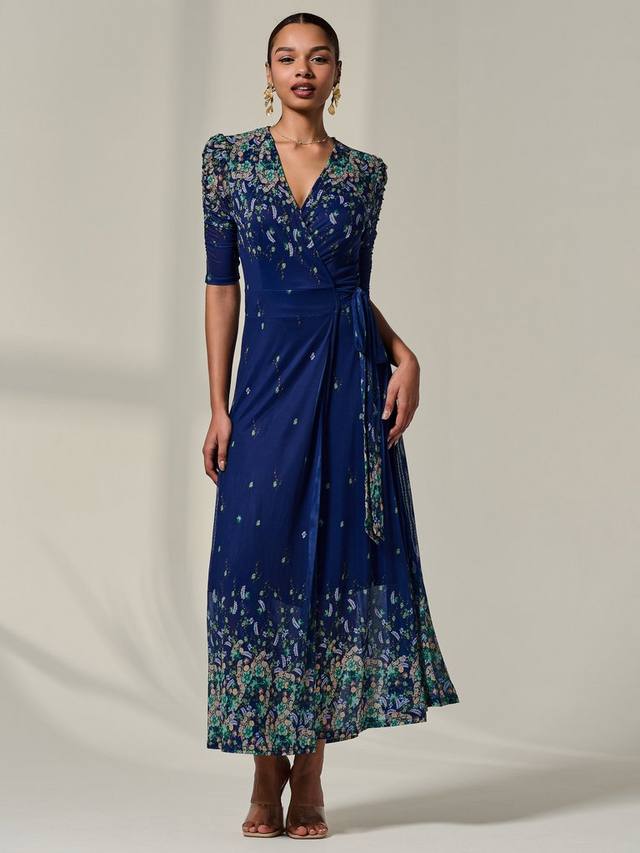 

Полумакси-платье с цветочным принтом и расклешенным подолом Jolie Moi