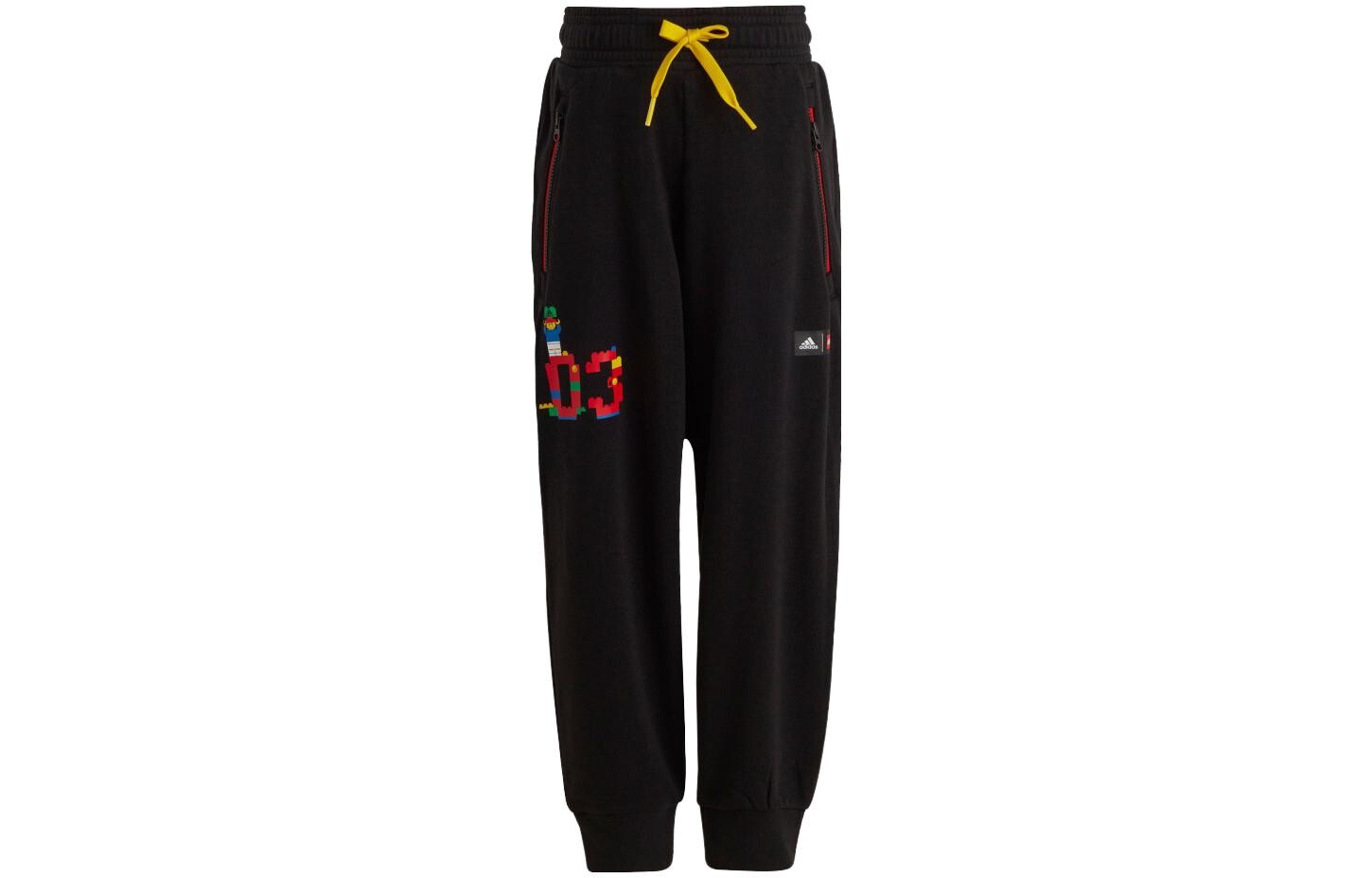 

Детские трикотажные спортивные штаны Adidas, черный/красный